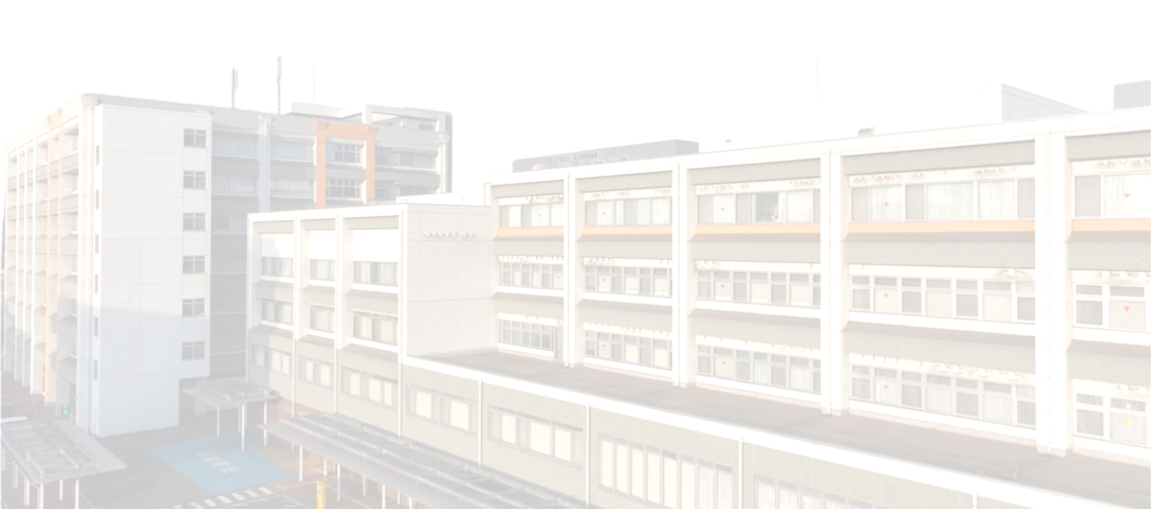 公式トップのCSS背景に掲載された福山医療センターの昼間の建物外観。
