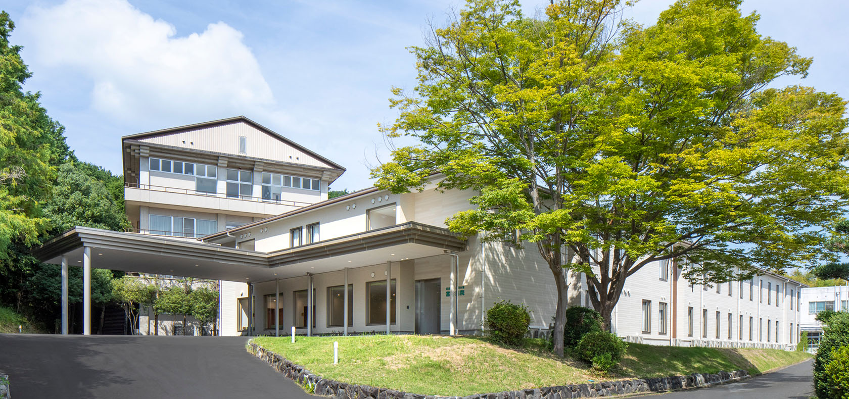 公式トップ掲載の當麻病院建物外観