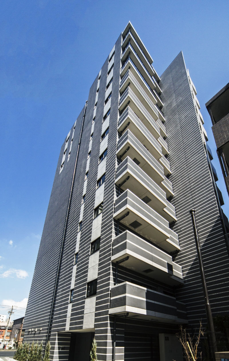 公式の資産運用型マンション事業ページに掲載された自社ブランドマンション外観