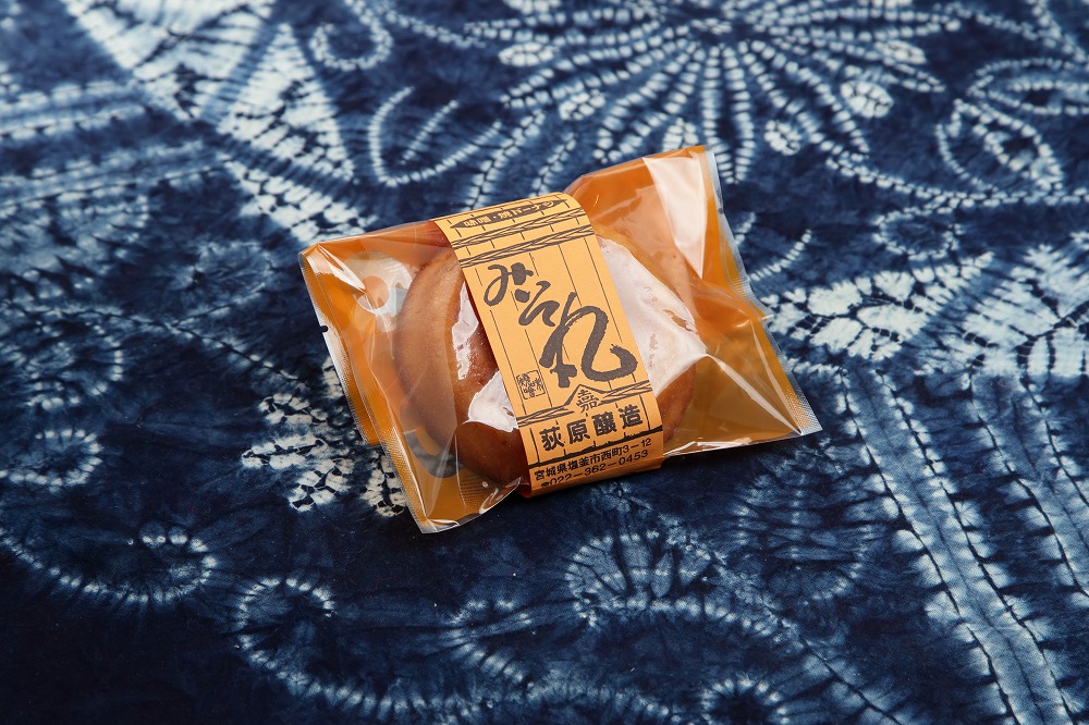 公式商品ページに掲載された、荻原醸造のみそ味焼ドーナツ「みそ丸」